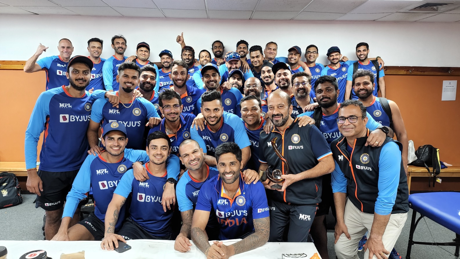 Indian players and support staff posing after ODI series win over West Indies.