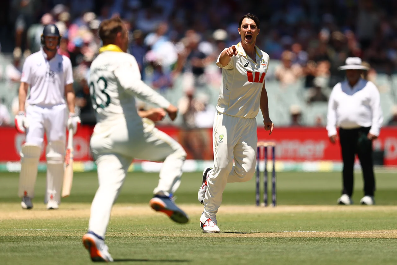 Marnus Labuschagne wheels away in celebration with an ecstatic Pat Cummins after stunner to dispatch Ollie Pope on Day 4 of the Adelaide Ashes Test